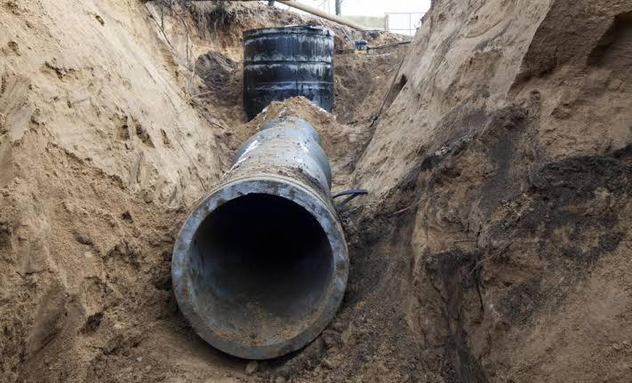 Underground main sewer line pipe inspected for blockage clearing in Houston, TX 77002